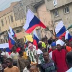 Protesters raise Russian flag in Kano