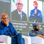 Leo Stan Ekeh, left, at the event