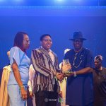 Mary-Brenda Akoda (center), winner of The Nigeria Prize for Science & Innovation, receives her award from Adeleye Falade, NLNG’s MD/CEO, with her mother, Mrs Akoda, by her side.